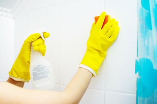 Commercial cleaning team maintaining office desks and floors