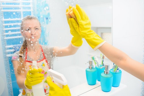 Office cleaners in Roehampton cleaning kitchen and restroom facilities